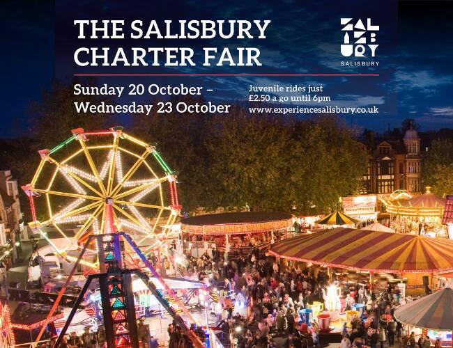 Brightly lit rides and bustling crowds at Salisbury Charter Fair, featuring various attractions at night. The event runs from Sunday 20th October to Wednesday 23rd October.